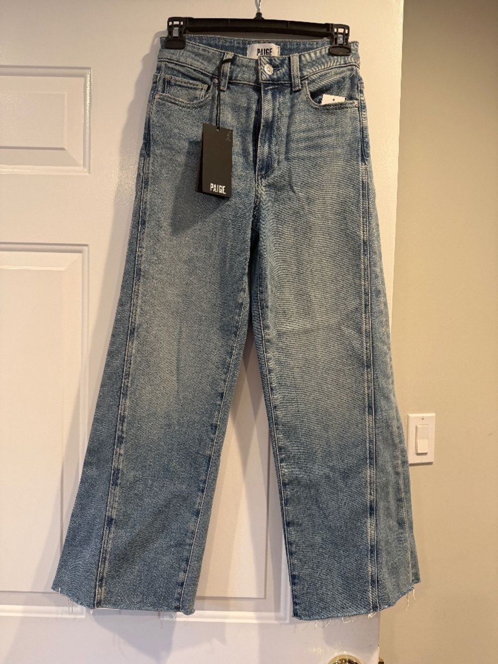NWT PAIGE Anessa High Rise Raw Hem Twisted Outseam Wide Leg Jeans Size 24